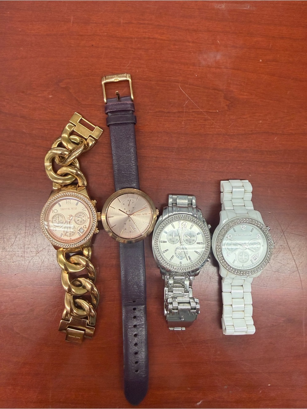 Michael Kors Women's 4 Piece Watch Set. Gold, Silver, White & Rose Gold